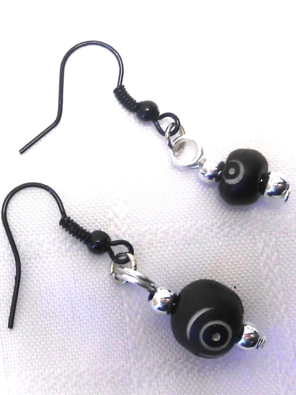 Beautiful handmade earrings with engraved elk bone no 1665